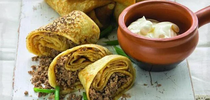 Домашние блинчики с начинкой из тушёнки. \ Фото: google.com.