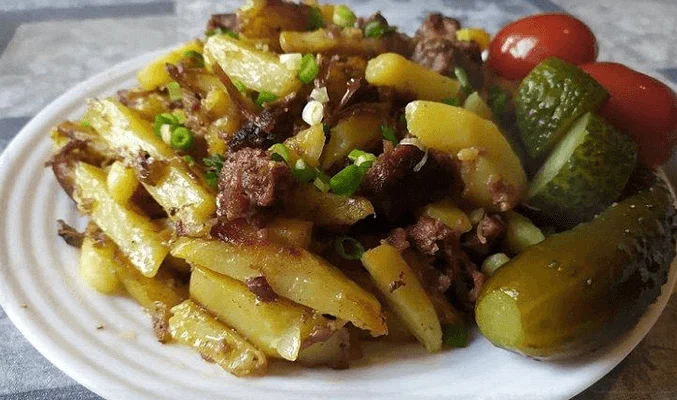 Картошка, жаренная с тушенкой
